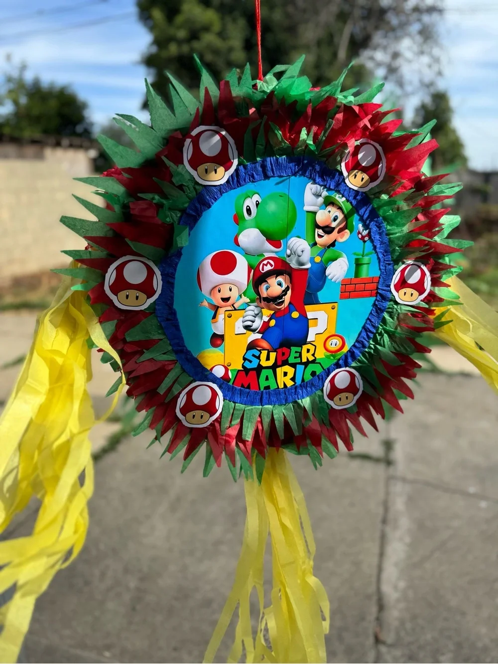 Super Mario Red & Green Party Piñata with Yellow Streamers